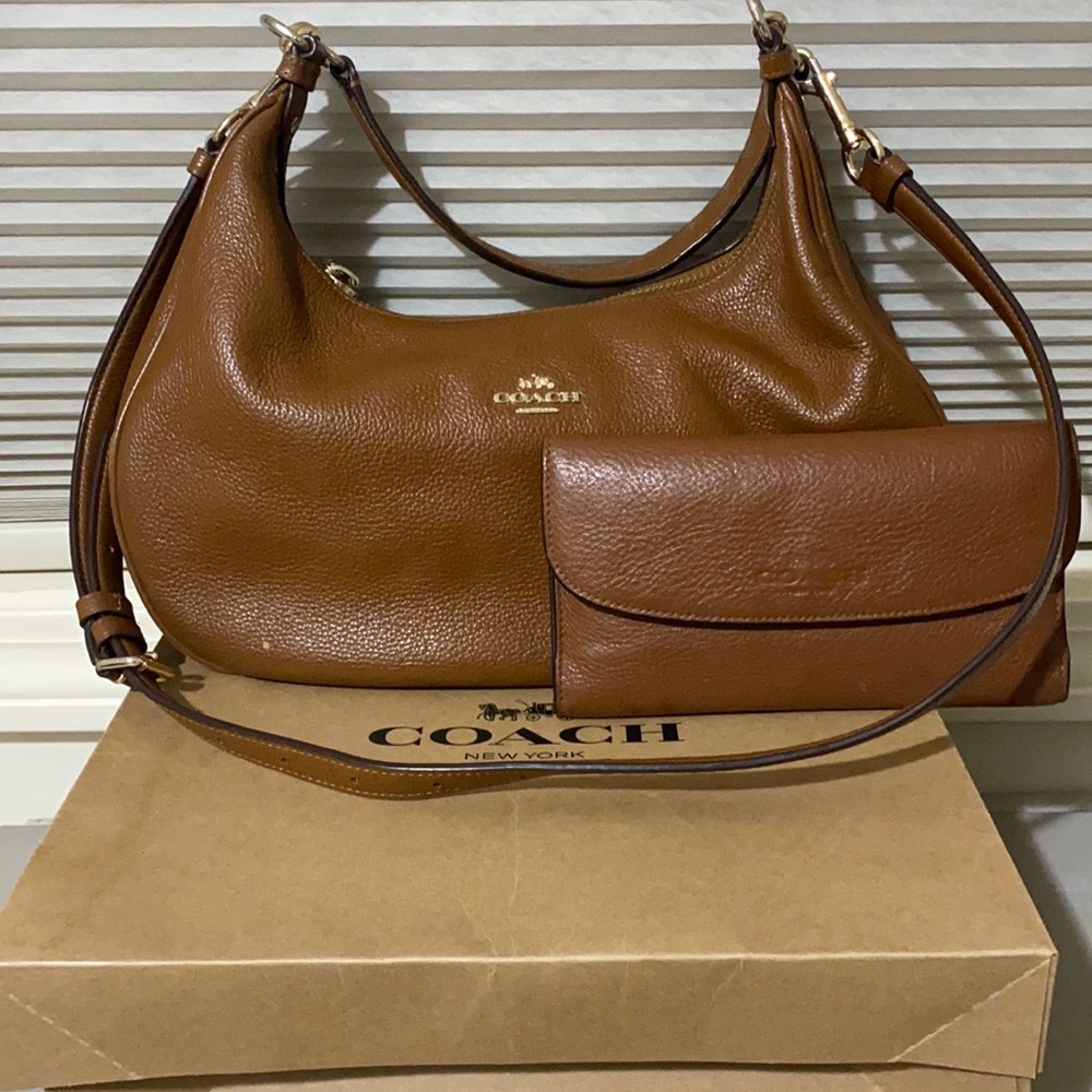 Coach brown purse with wallet used is in great condition